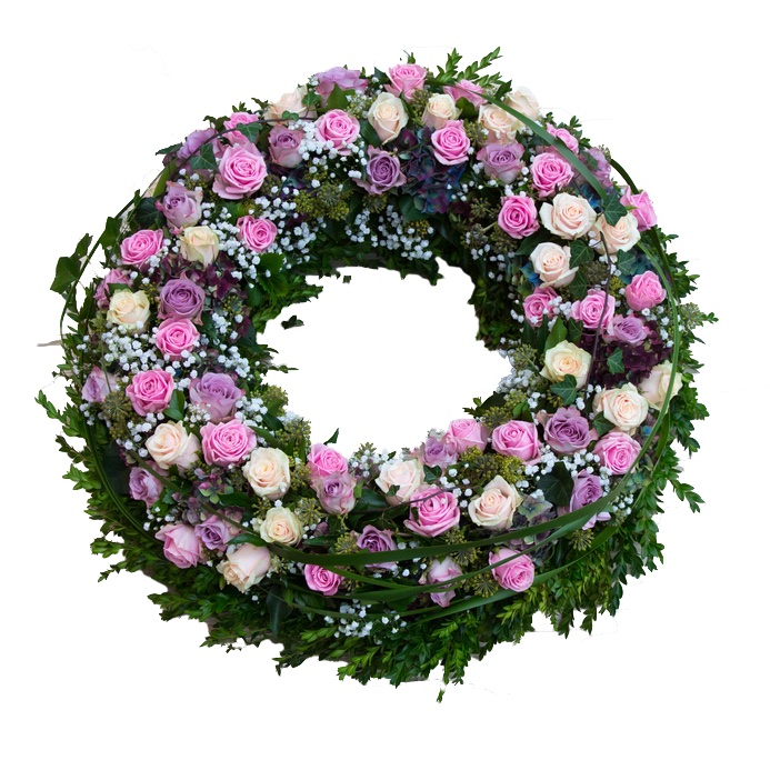 corona funeraria con rosas rosadas y moradas